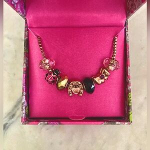 Betsy Johnson Ladybug Charm Necklace with Gold chain.